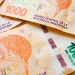 Close-up macro of bills of 1000 Argentine pesos disordered